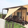 ウッドデッキ付き平屋の外観｜つくばみらい市の注文住宅,ログハウスのような低価格住宅を建てるならエイ・ワン