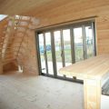大きな高窓のある二階建てのテーブルカウンター｜瀬戸市の注文住宅,ログハウスのような低価格住宅を建てるならエイ・ワン